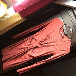 Long sleeve dress with a sexy cut on the front